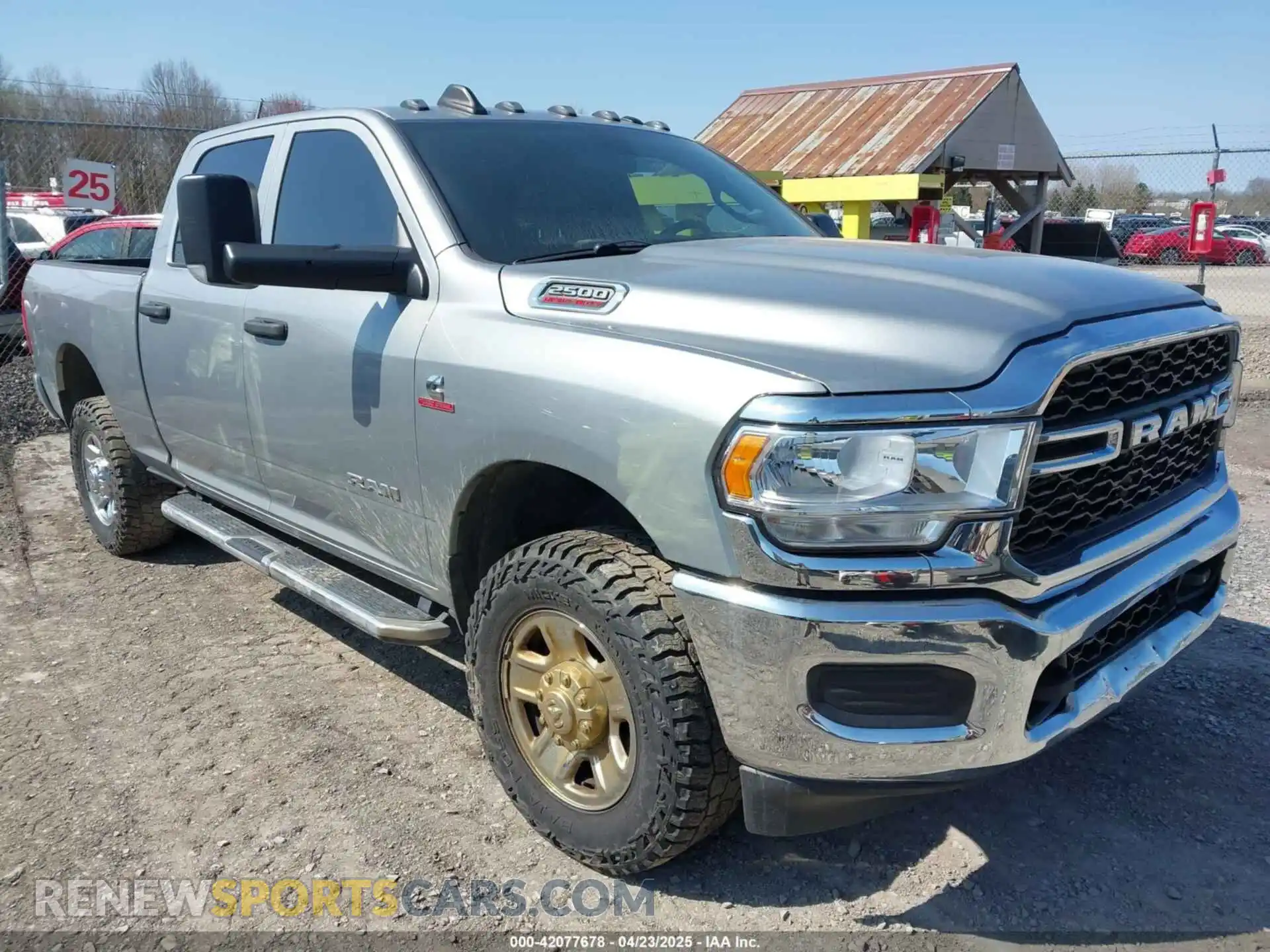 1 Photograph of a damaged car 3C6UR5CL8NG280660 RAM 2500 2022