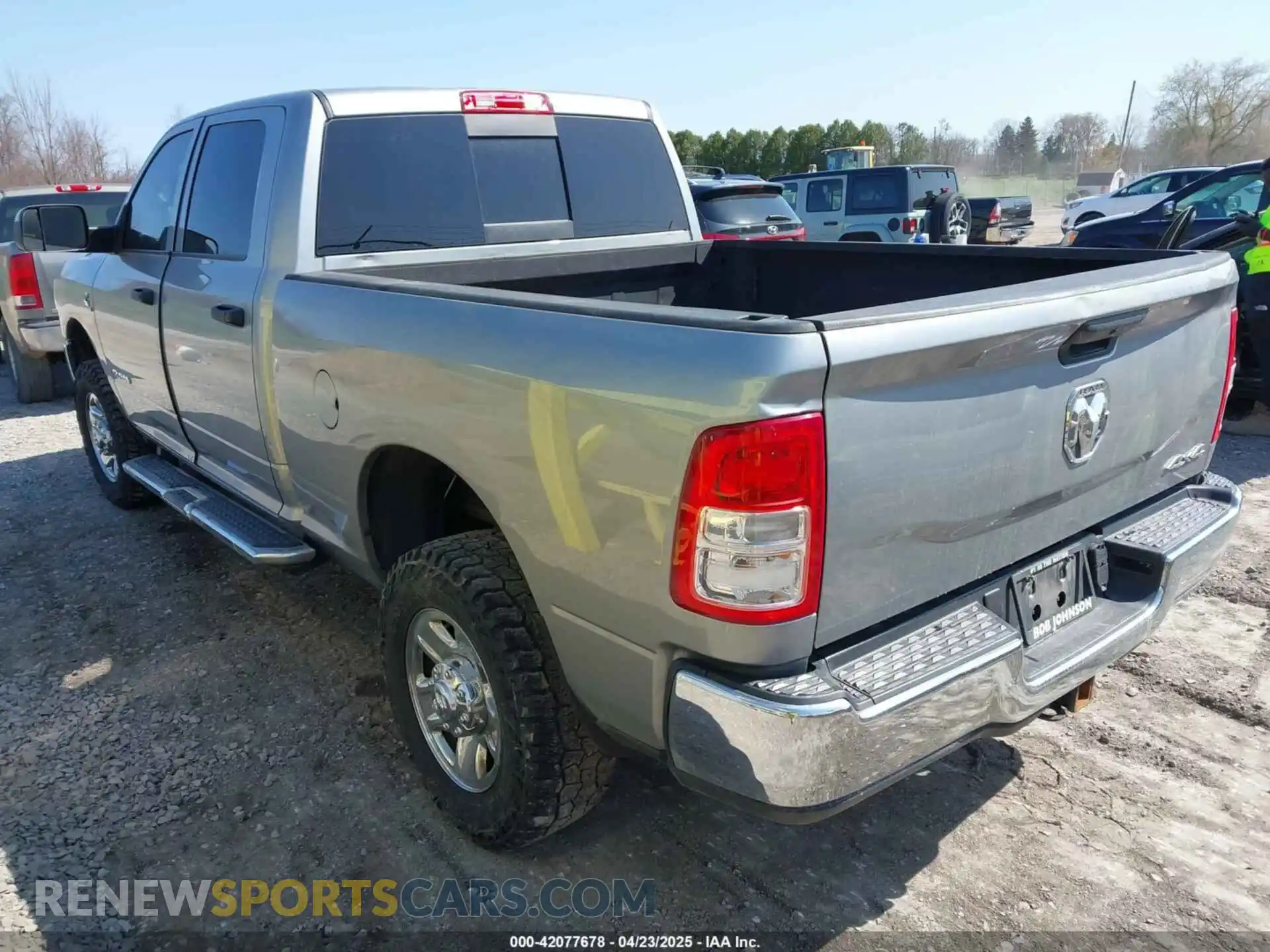 3 Photograph of a damaged car 3C6UR5CL8NG280660 RAM 2500 2022