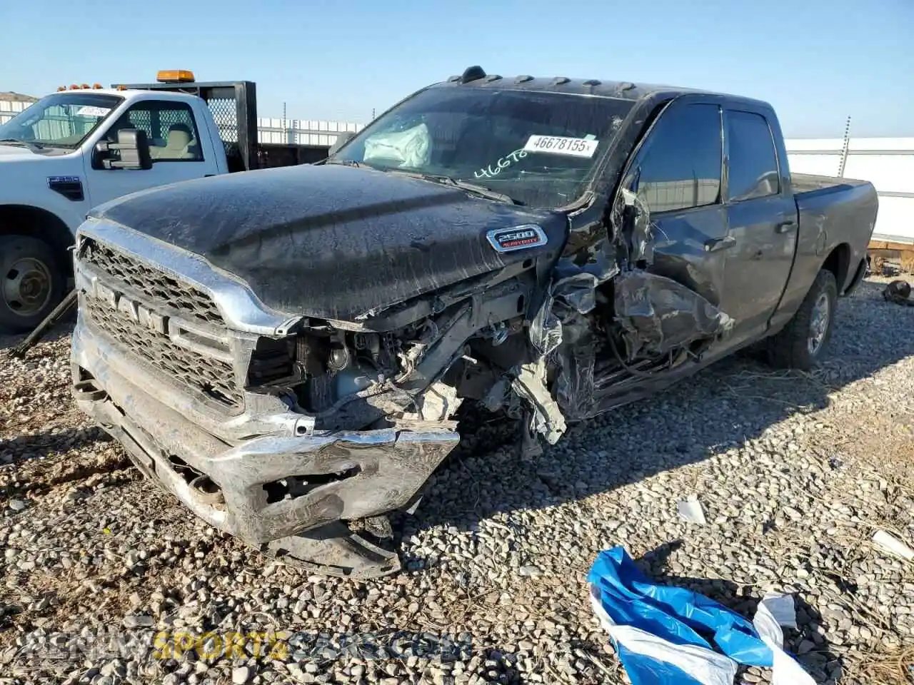 1 Photograph of a damaged car 3C6UR5CL8NG299323 RAM 2500 2022