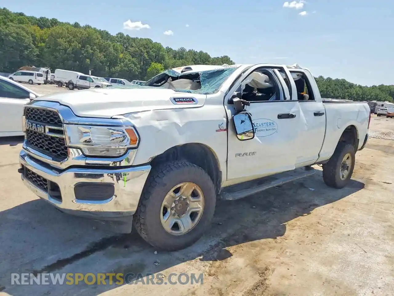 1 Photograph of a damaged car 3C6UR5CL8NG325418 RAM 2500 2022
