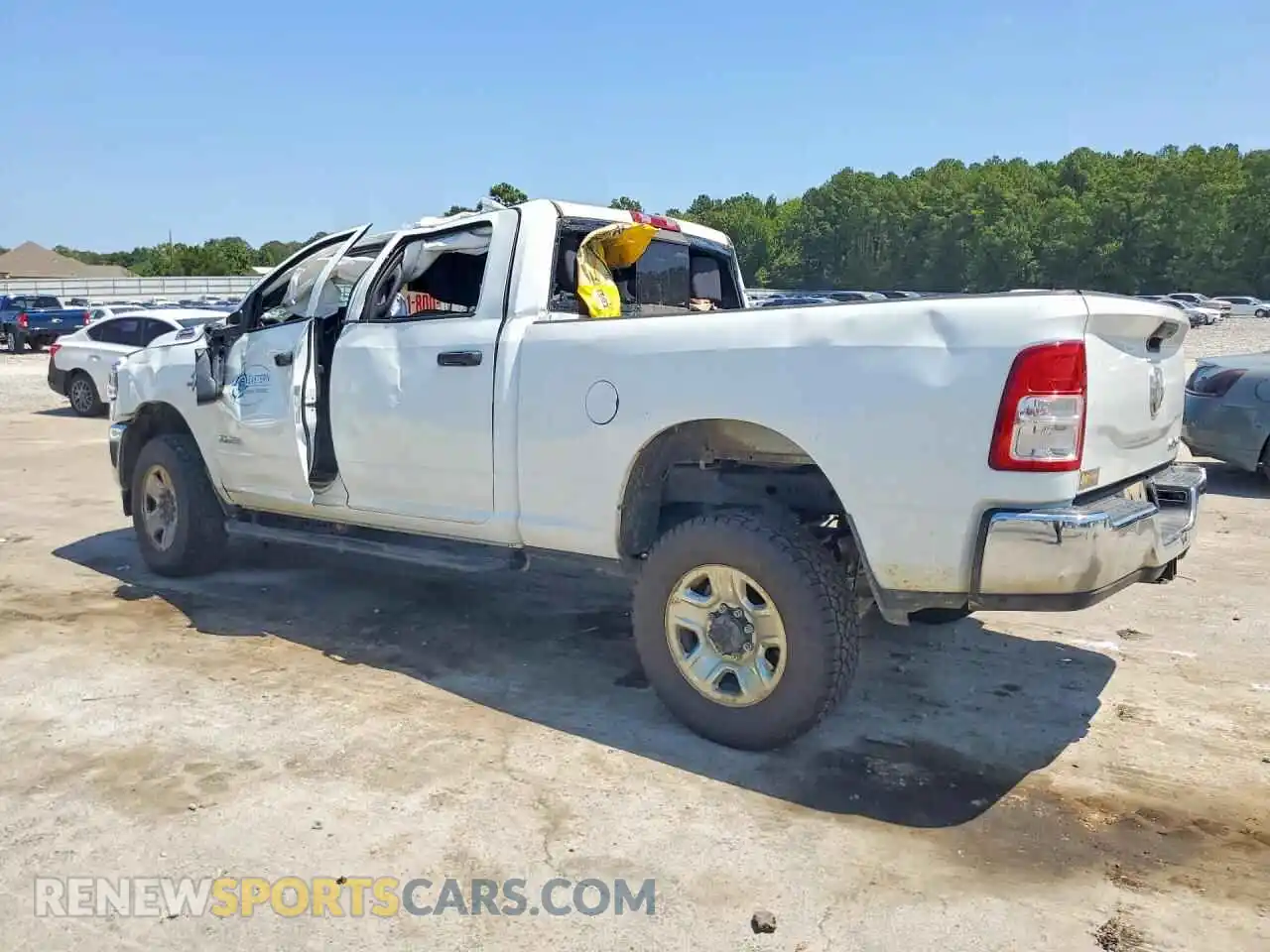 2 Photograph of a damaged car 3C6UR5CL8NG325418 RAM 2500 2022