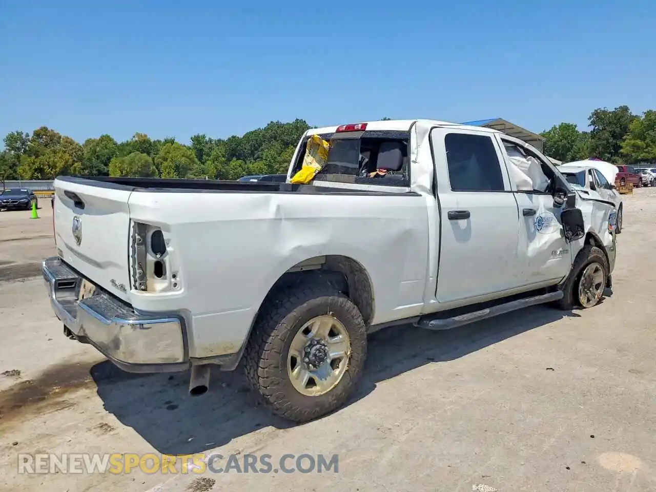 3 Photograph of a damaged car 3C6UR5CL8NG325418 RAM 2500 2022