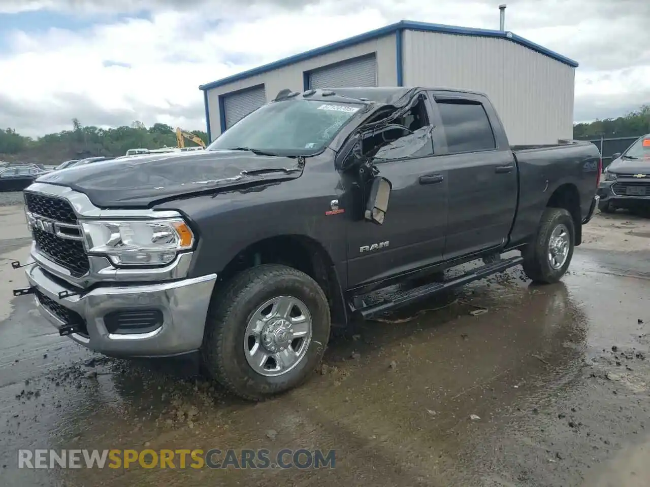 1 Photograph of a damaged car 3C6UR5CL8NG383710 RAM 2500 2022