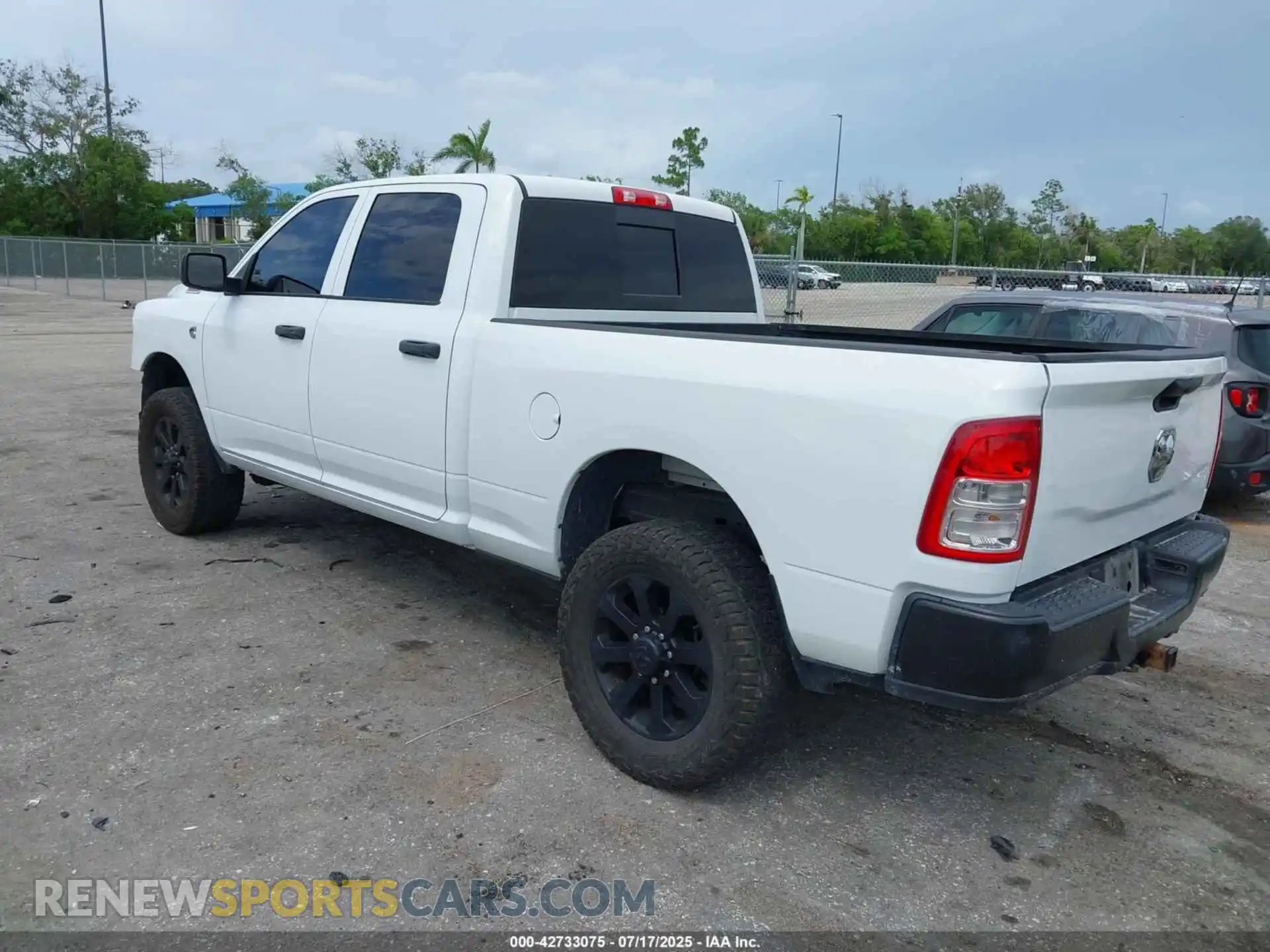 3 Photograph of a damaged car 3C6UR5CLXNG221366 RAM 2500 2022