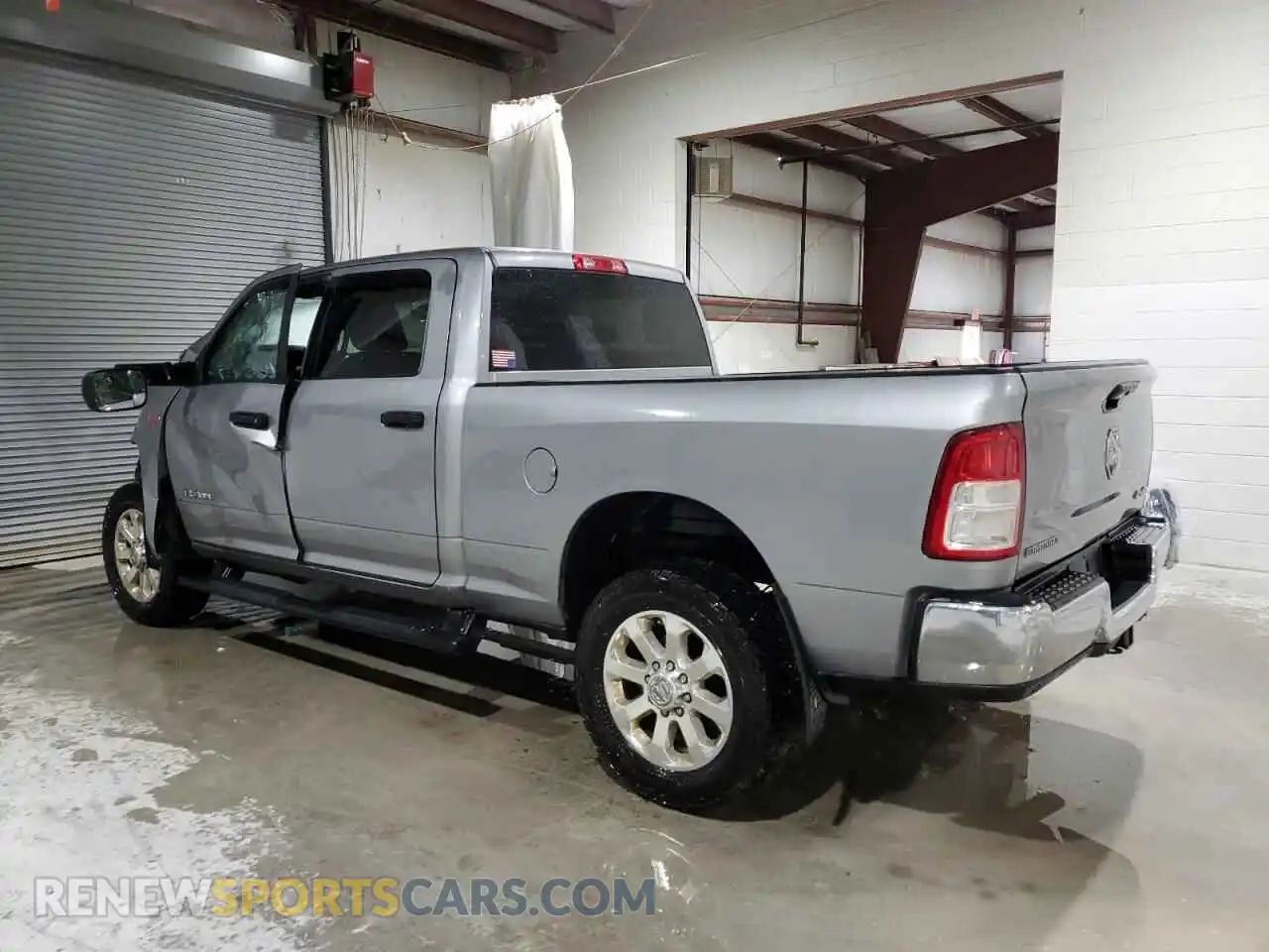 2 Photograph of a damaged car 3C6UR5DJ1NG399261 RAM 2500 2022
