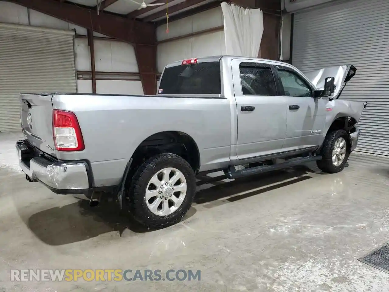 3 Photograph of a damaged car 3C6UR5DJ1NG399261 RAM 2500 2022