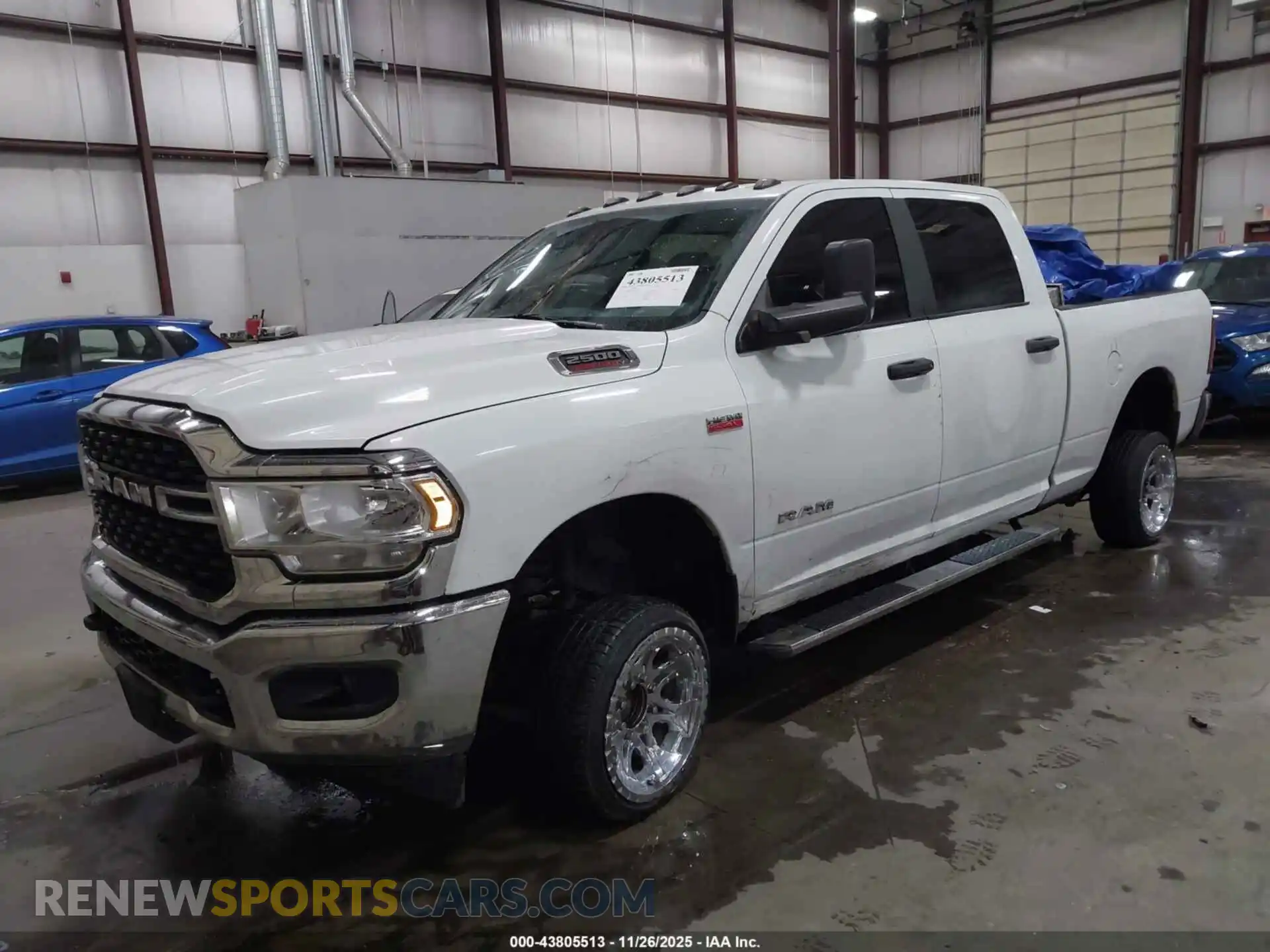 2 Photograph of a damaged car 3C6UR5DJ2NG350196 RAM 2500 2022