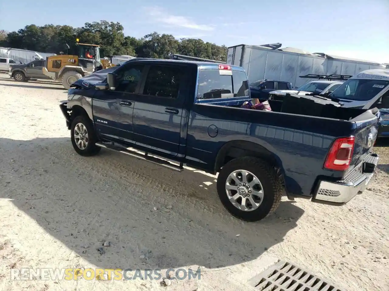 2 Photograph of a damaged car 3C6UR5DJ3NG170399 RAM 2500 2022