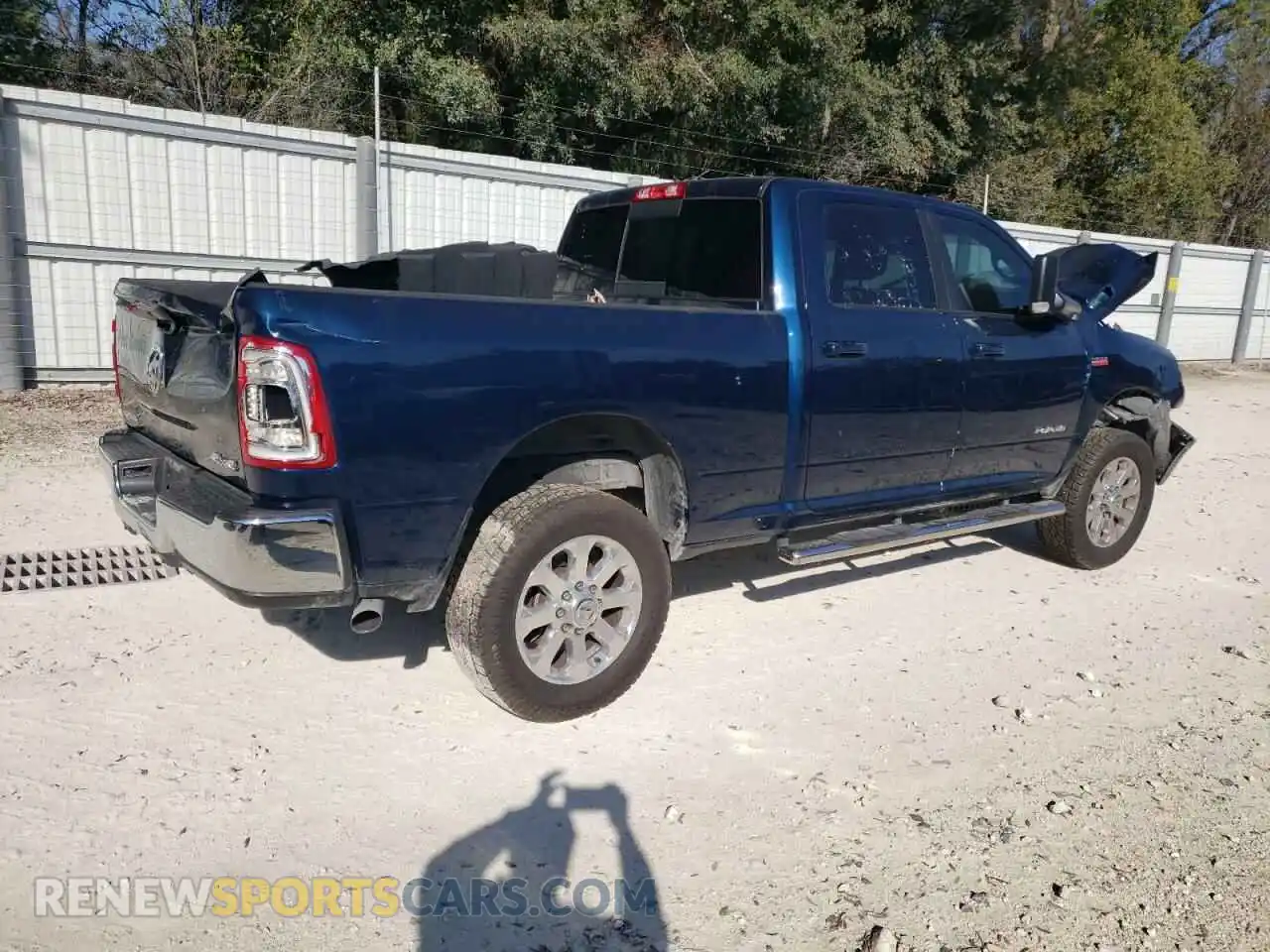 3 Photograph of a damaged car 3C6UR5DJ3NG170399 RAM 2500 2022