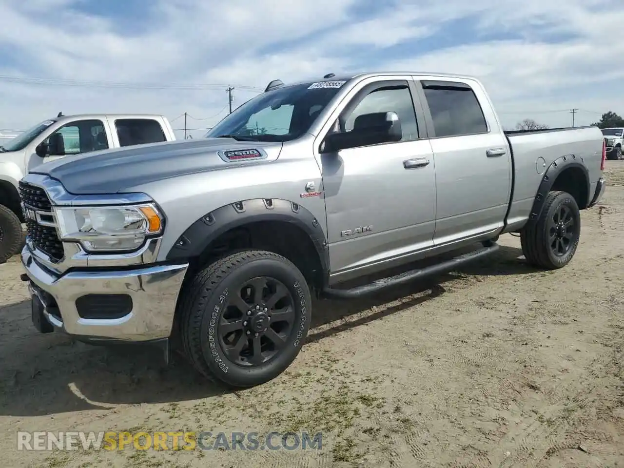 1 Photograph of a damaged car 3C6UR5DL0NG253497 RAM 2500 2022