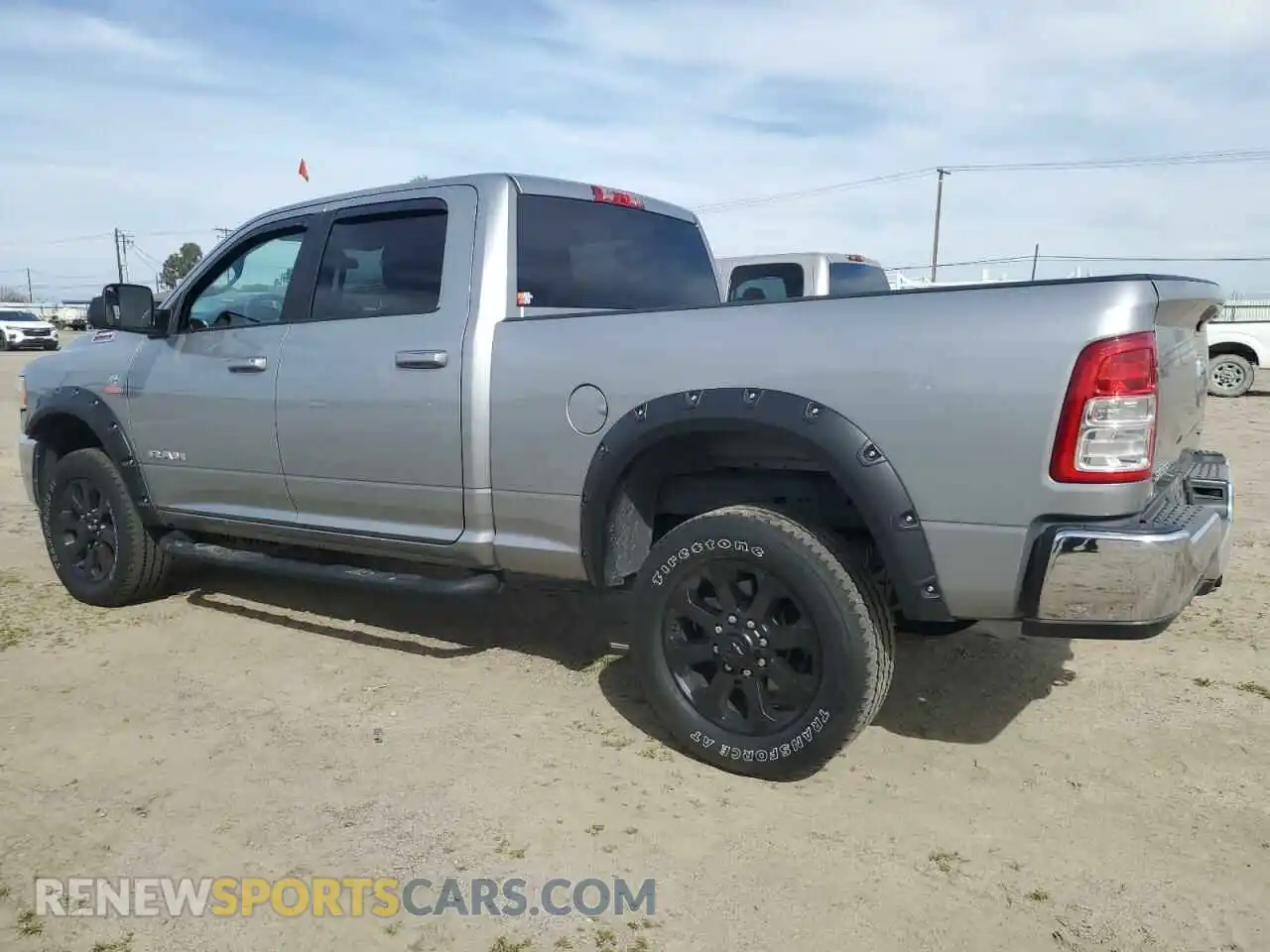2 Photograph of a damaged car 3C6UR5DL0NG253497 RAM 2500 2022