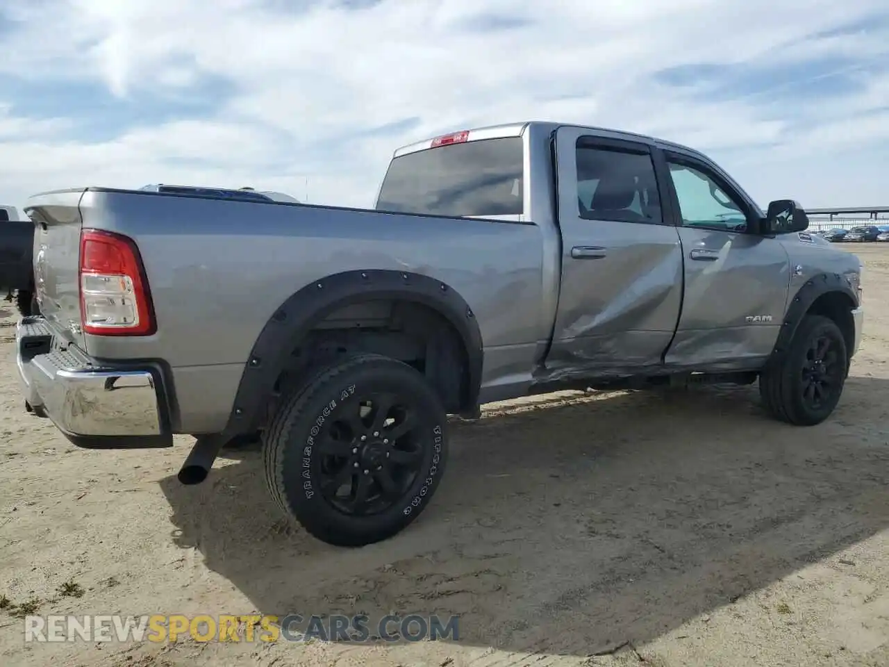 3 Photograph of a damaged car 3C6UR5DL0NG253497 RAM 2500 2022