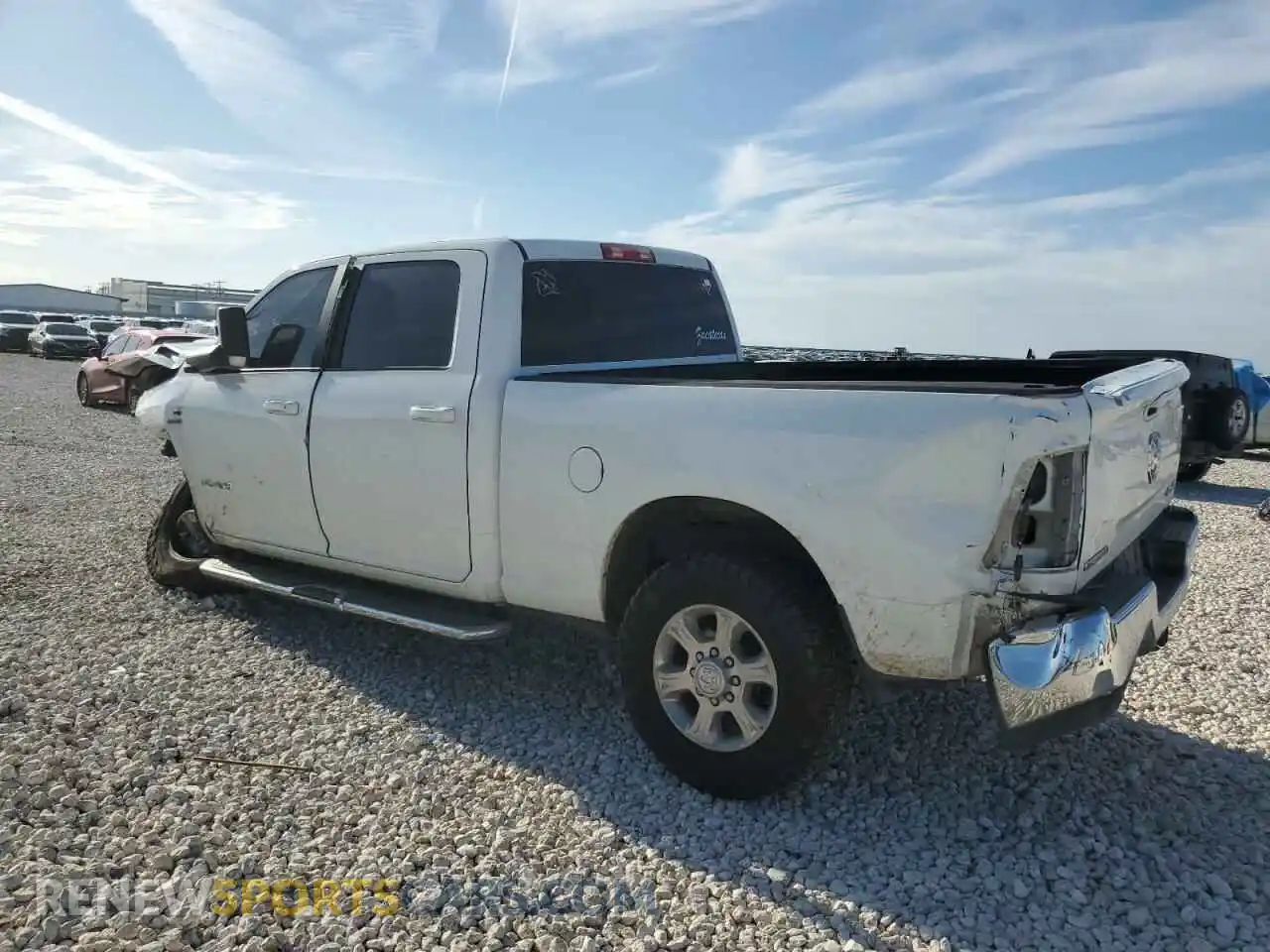 2 Photograph of a damaged car 3C6UR5DL0NG298052 RAM 2500 2022