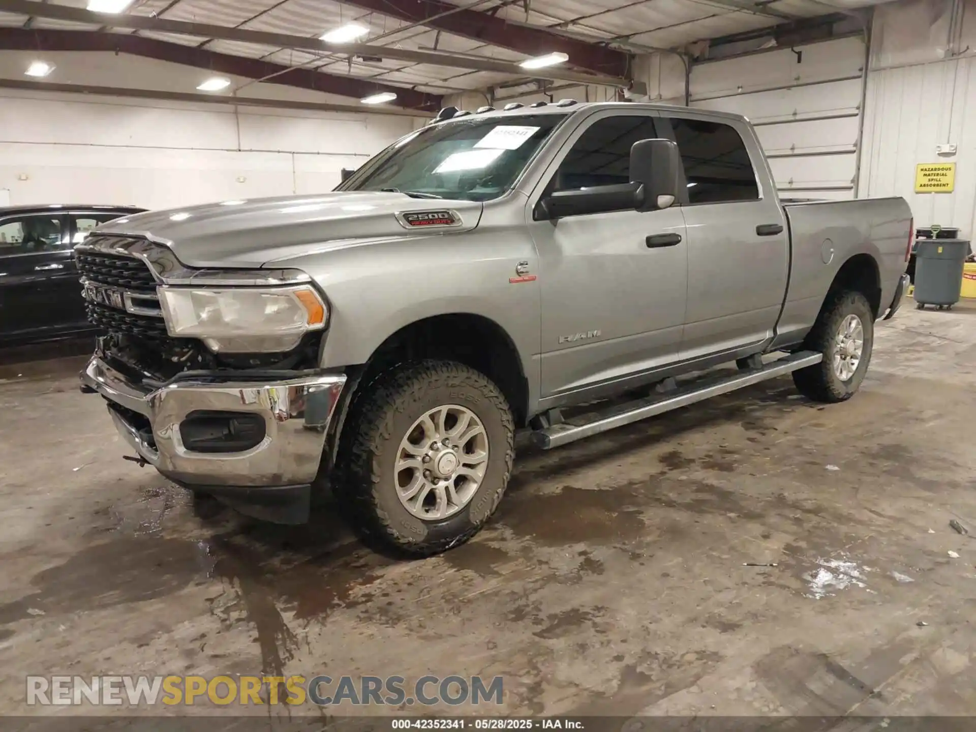 2 Photograph of a damaged car 3C6UR5DL0NG370058 RAM 2500 2022