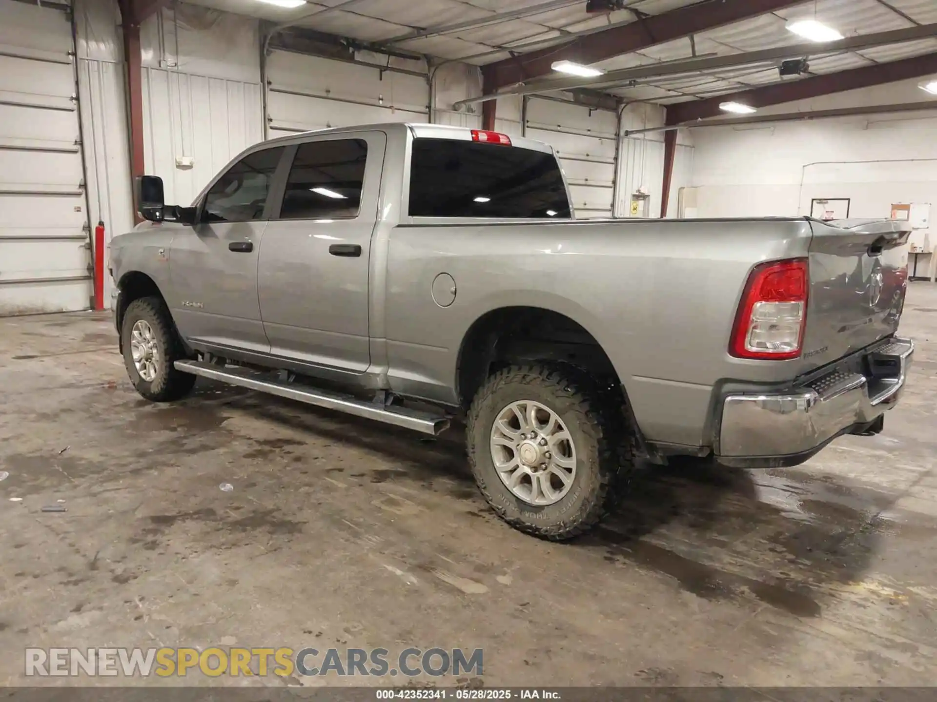 3 Photograph of a damaged car 3C6UR5DL0NG370058 RAM 2500 2022