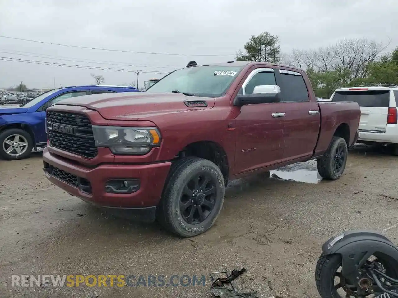 1 Photograph of a damaged car 3C6UR5DL1NG168751 RAM 2500 2022