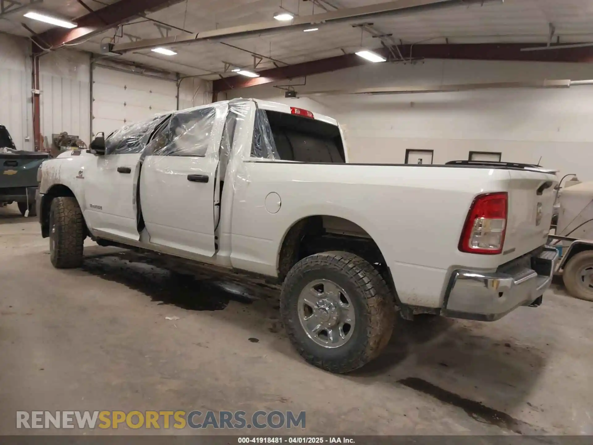 3 Photograph of a damaged car 3C6UR5DL1NG336663 RAM 2500 2022