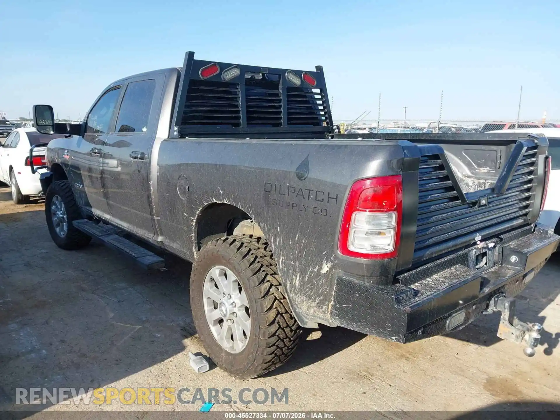 3 Photograph of a damaged car 3C6UR5DL2NG128937 RAM 2500 2022