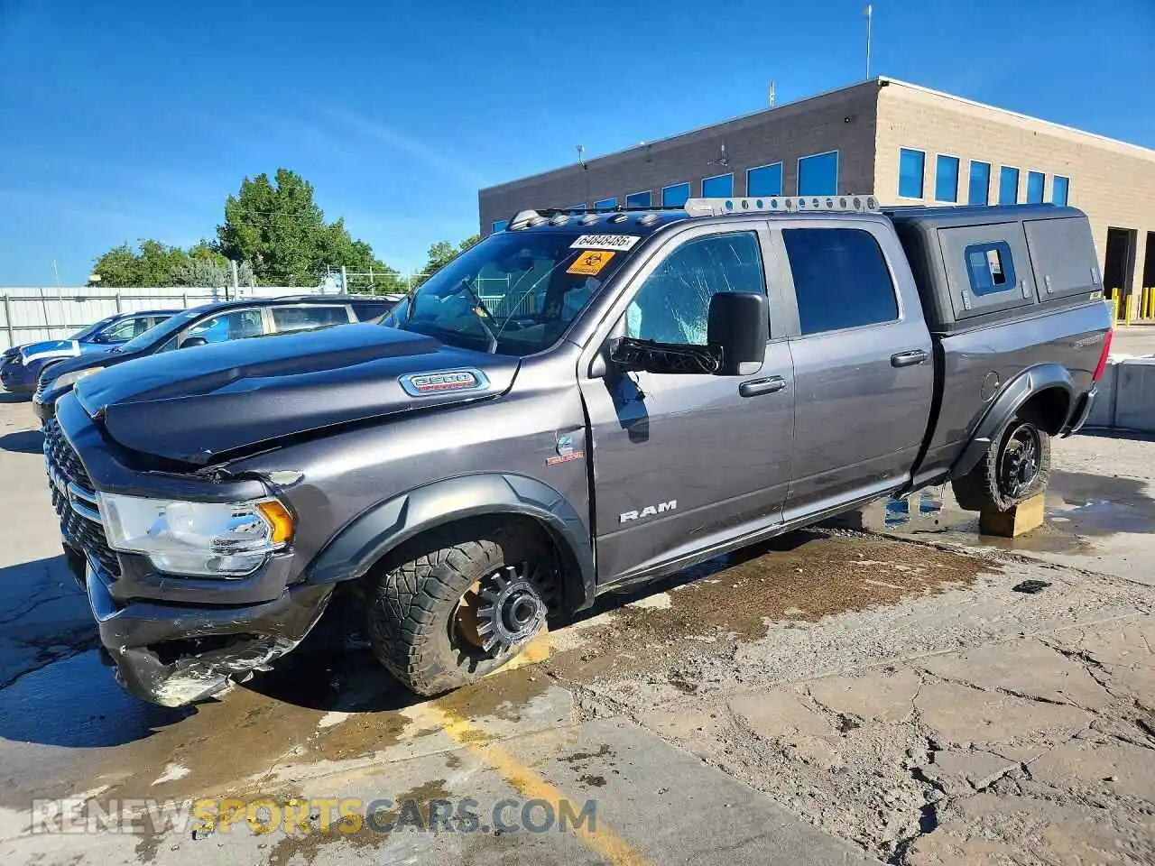 1 Photograph of a damaged car 3C6UR5DL2NG146094 RAM 2500 2022