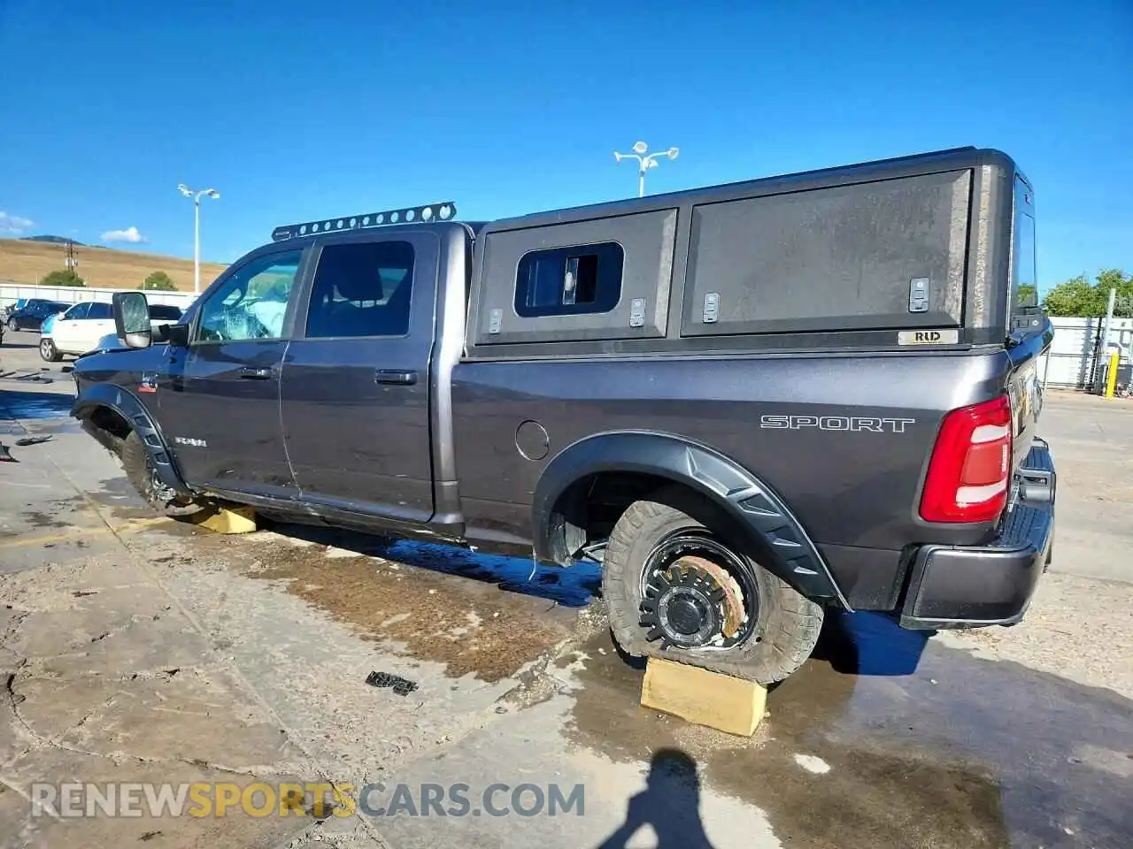 2 Photograph of a damaged car 3C6UR5DL2NG146094 RAM 2500 2022