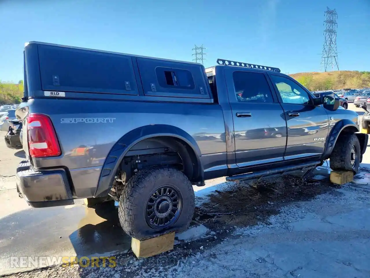 3 Photograph of a damaged car 3C6UR5DL2NG146094 RAM 2500 2022