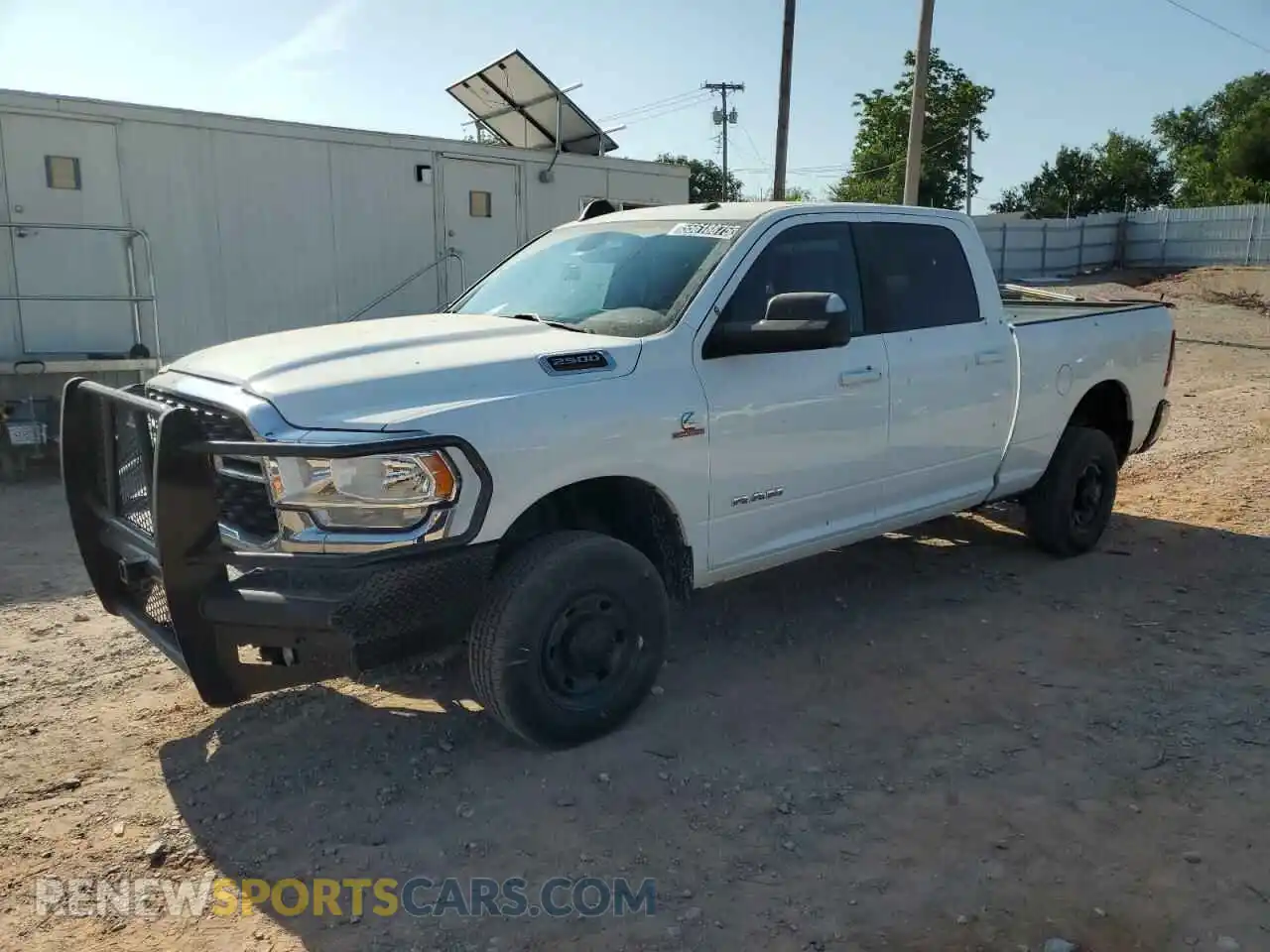 1 Photograph of a damaged car 3C6UR5DL3NG322697 RAM 2500 2022