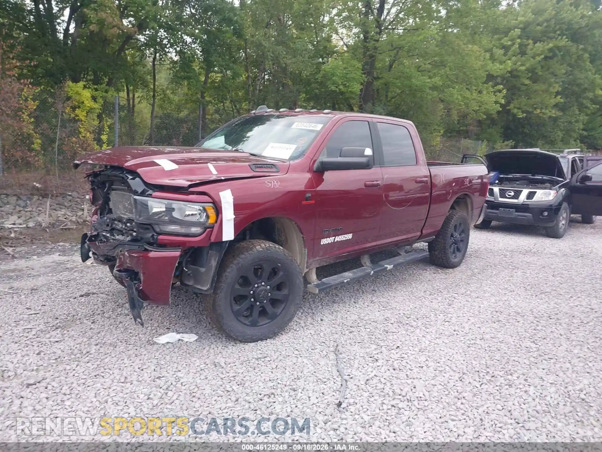2 Photograph of a damaged car 3C6UR5DL3NG327334 RAM 2500 2022