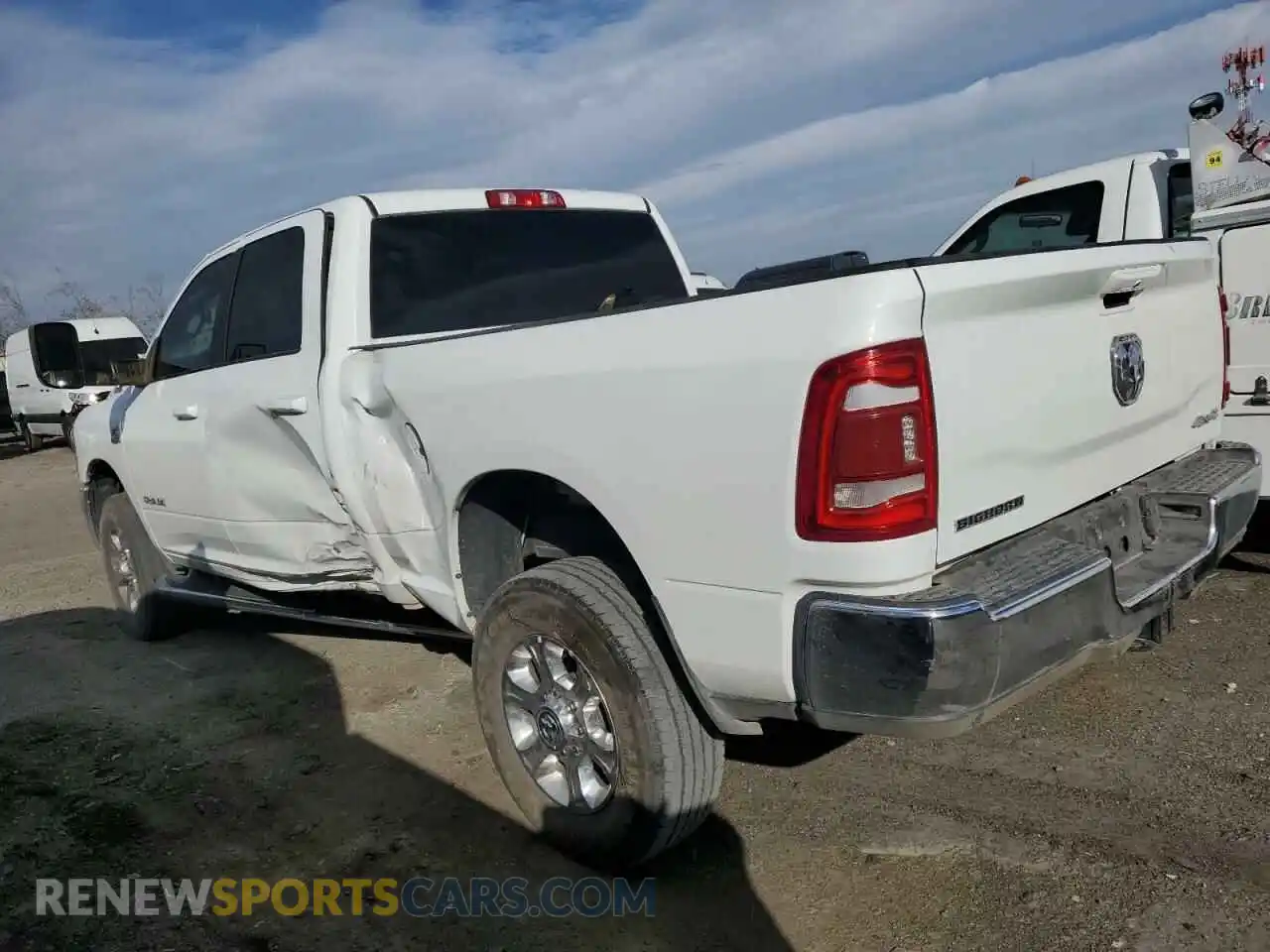 2 Photograph of a damaged car 3C6UR5DL4NG271534 RAM 2500 2022