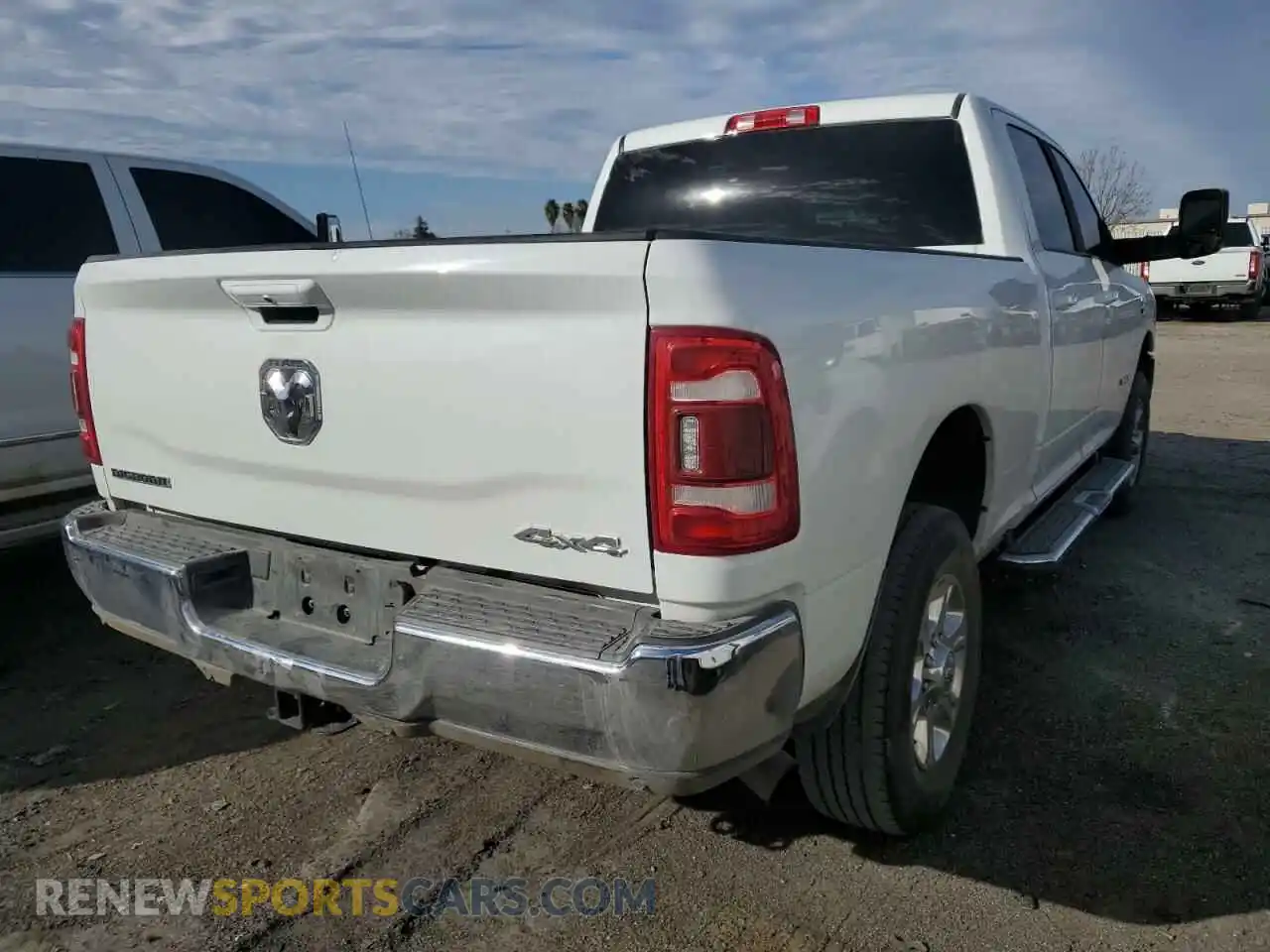 3 Photograph of a damaged car 3C6UR5DL4NG271534 RAM 2500 2022