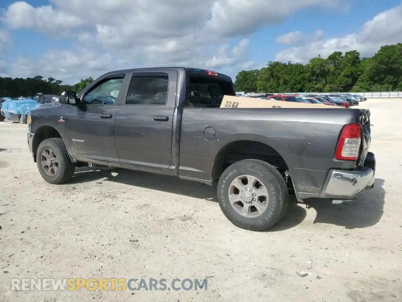 2 Photograph of a damaged car 3C6UR5DL4NG380267 RAM 2500 2022