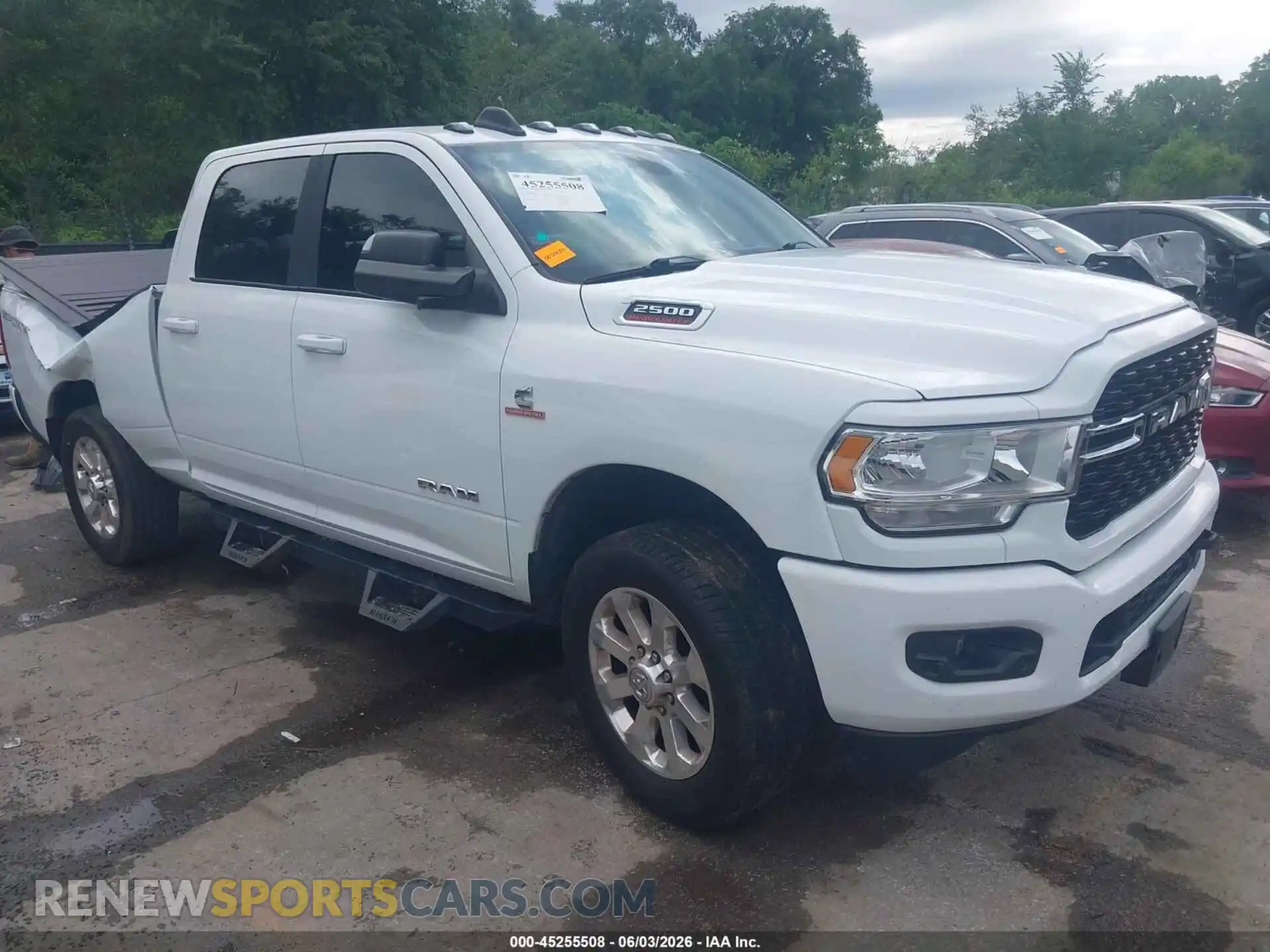 1 Photograph of a damaged car 3C6UR5DL5NG111775 RAM 2500 2022
