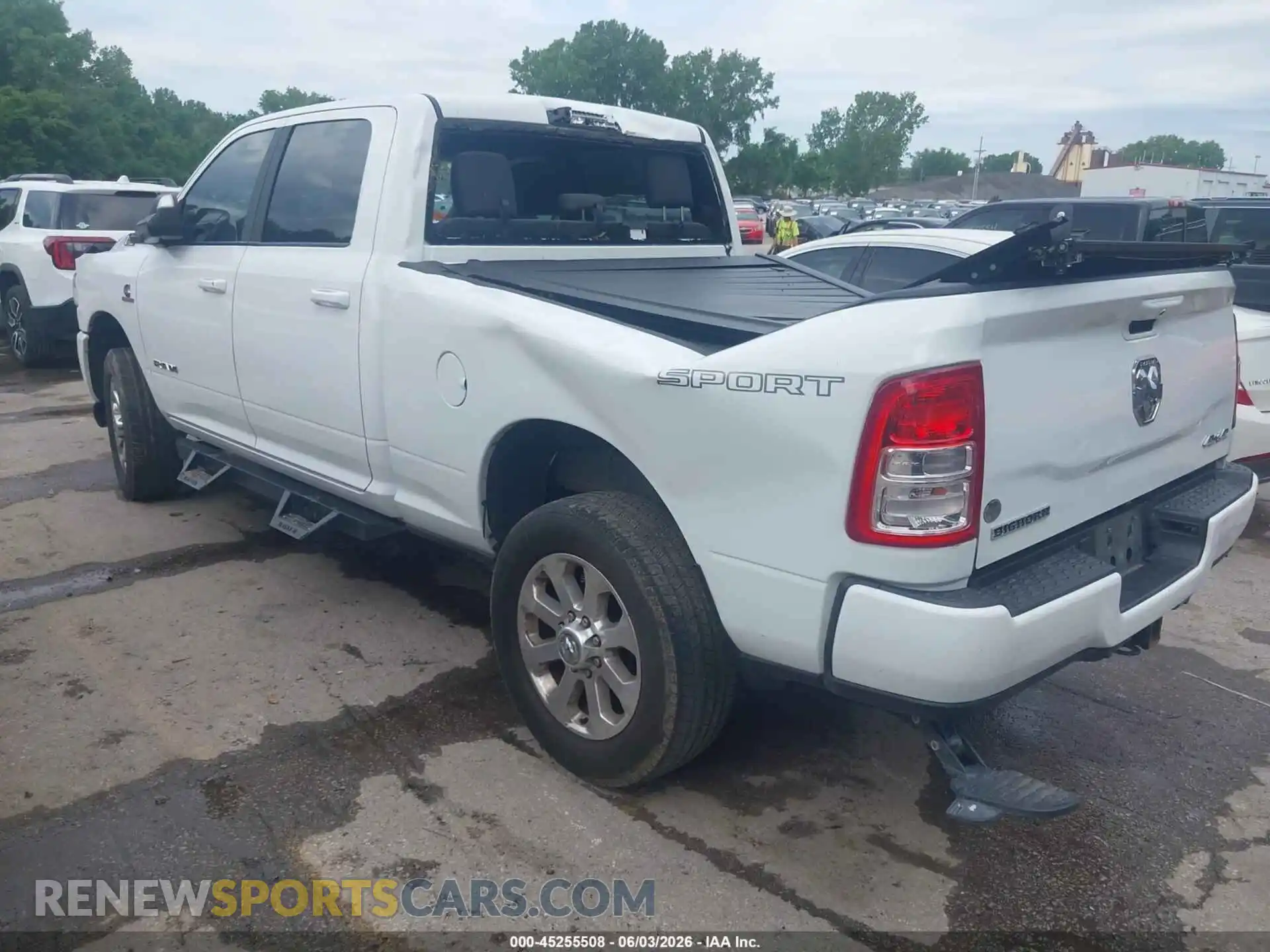 3 Photograph of a damaged car 3C6UR5DL5NG111775 RAM 2500 2022