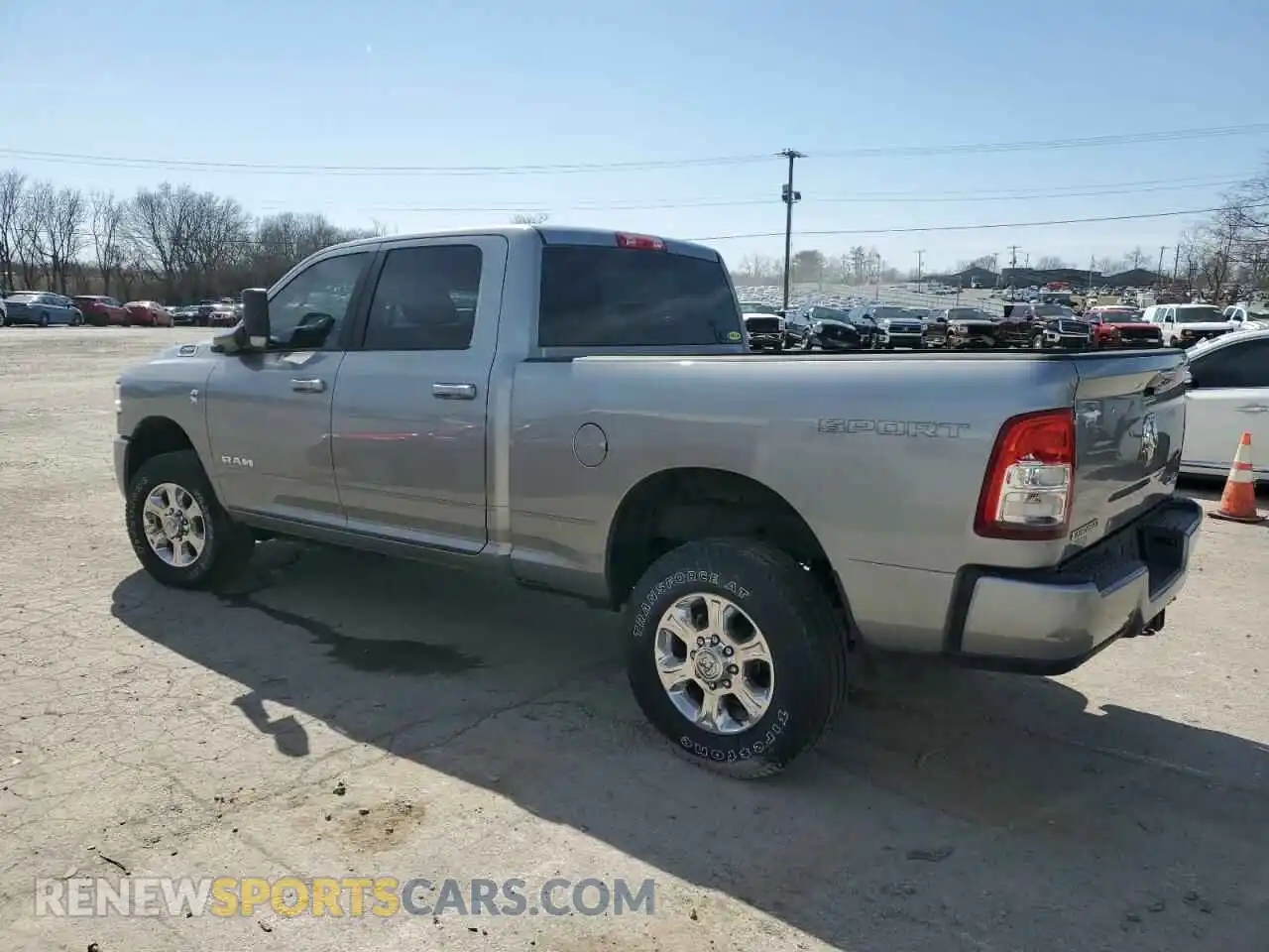 2 Photograph of a damaged car 3C6UR5DL5NG147112 RAM 2500 2022