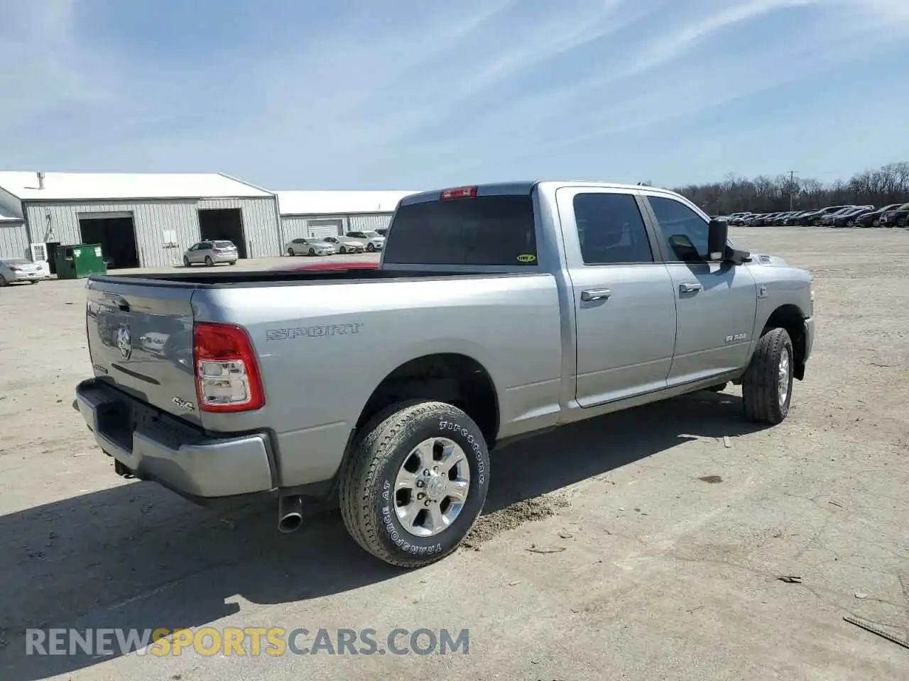 3 Photograph of a damaged car 3C6UR5DL5NG147112 RAM 2500 2022
