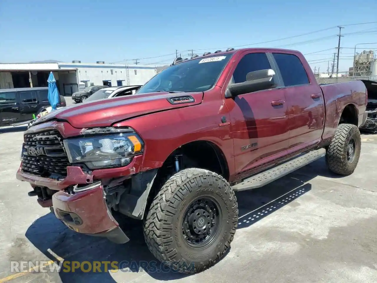 1 Photograph of a damaged car 3C6UR5DL5NG294904 RAM 2500 2022
