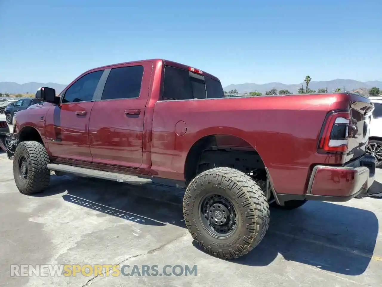 2 Photograph of a damaged car 3C6UR5DL5NG294904 RAM 2500 2022
