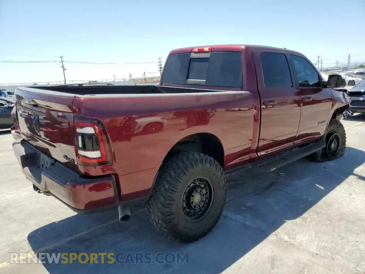 3 Photograph of a damaged car 3C6UR5DL5NG294904 RAM 2500 2022