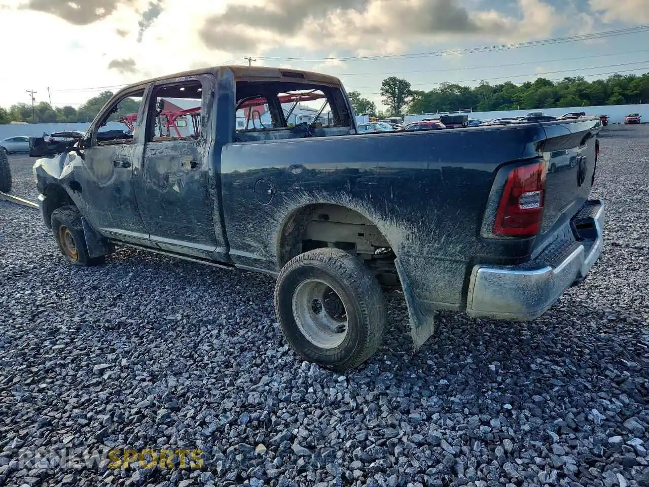 2 Photograph of a damaged car 3C6UR5DL5NG328338 RAM 2500 2022