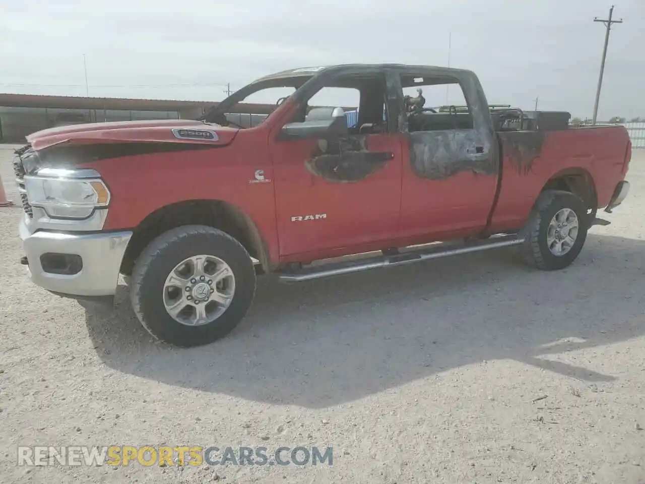 1 Photograph of a damaged car 3C6UR5DL5NG360836 RAM 2500 2022