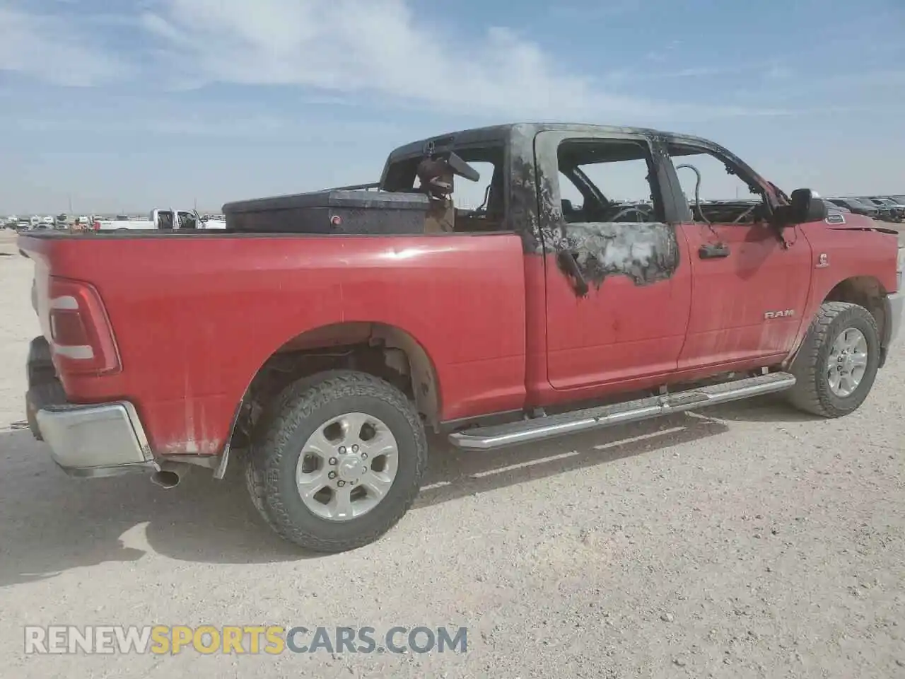 3 Photograph of a damaged car 3C6UR5DL5NG360836 RAM 2500 2022