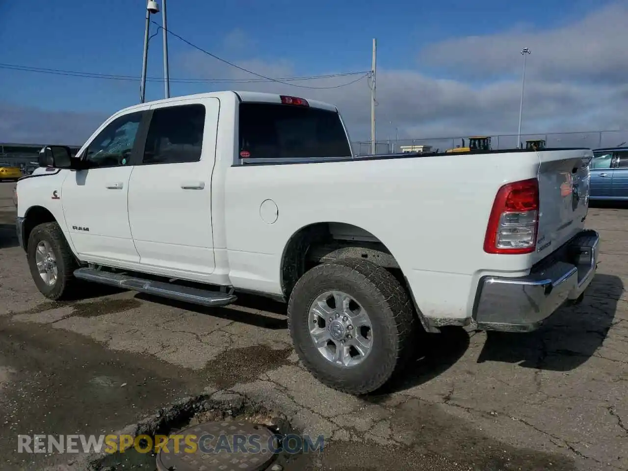 2 Photograph of a damaged car 3C6UR5DL6NG322208 RAM 2500 2022