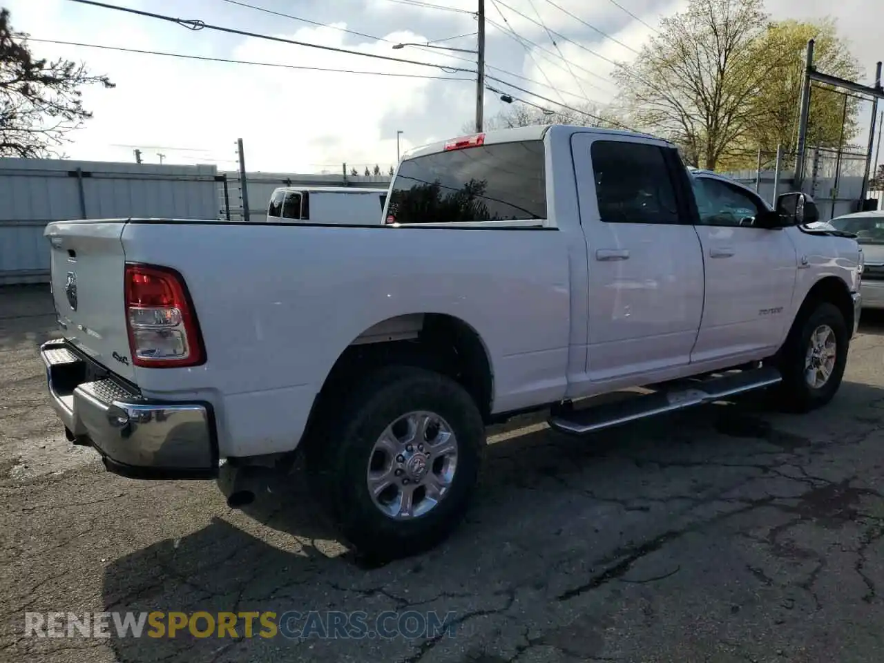 3 Photograph of a damaged car 3C6UR5DL6NG322208 RAM 2500 2022