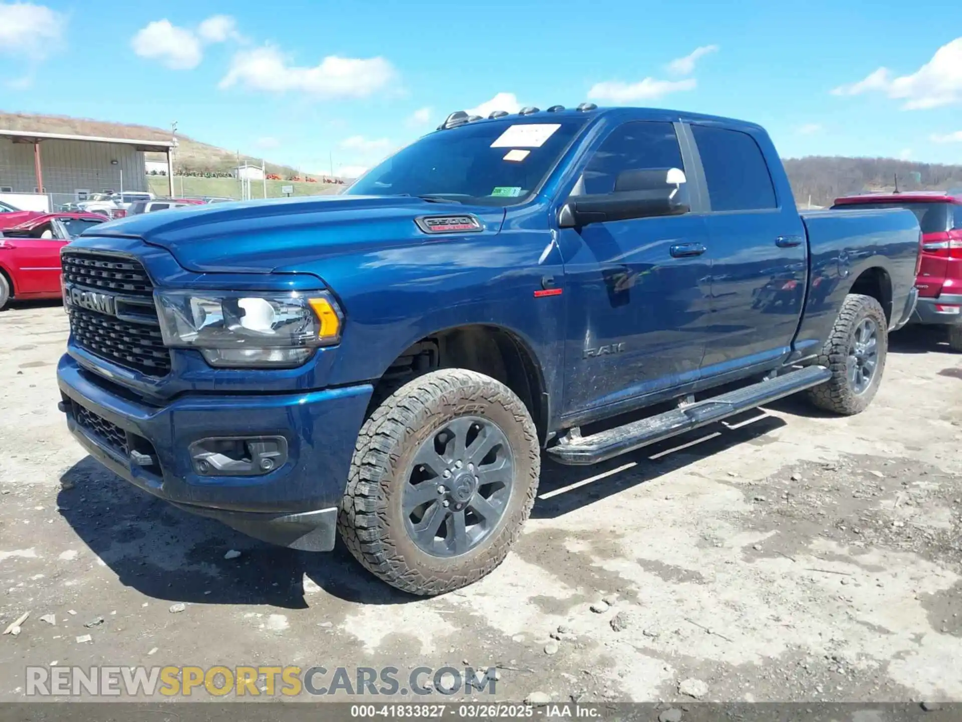 2 Photograph of a damaged car 3C6UR5DL7NG124897 RAM 2500 2022