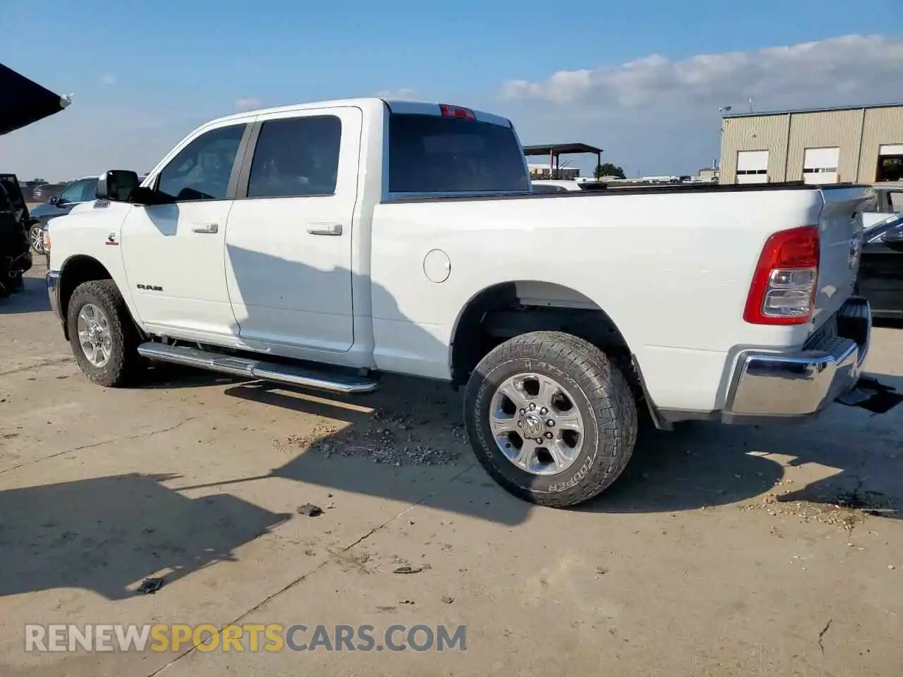 2 Photograph of a damaged car 3C6UR5DL7NG272225 RAM 2500 2022