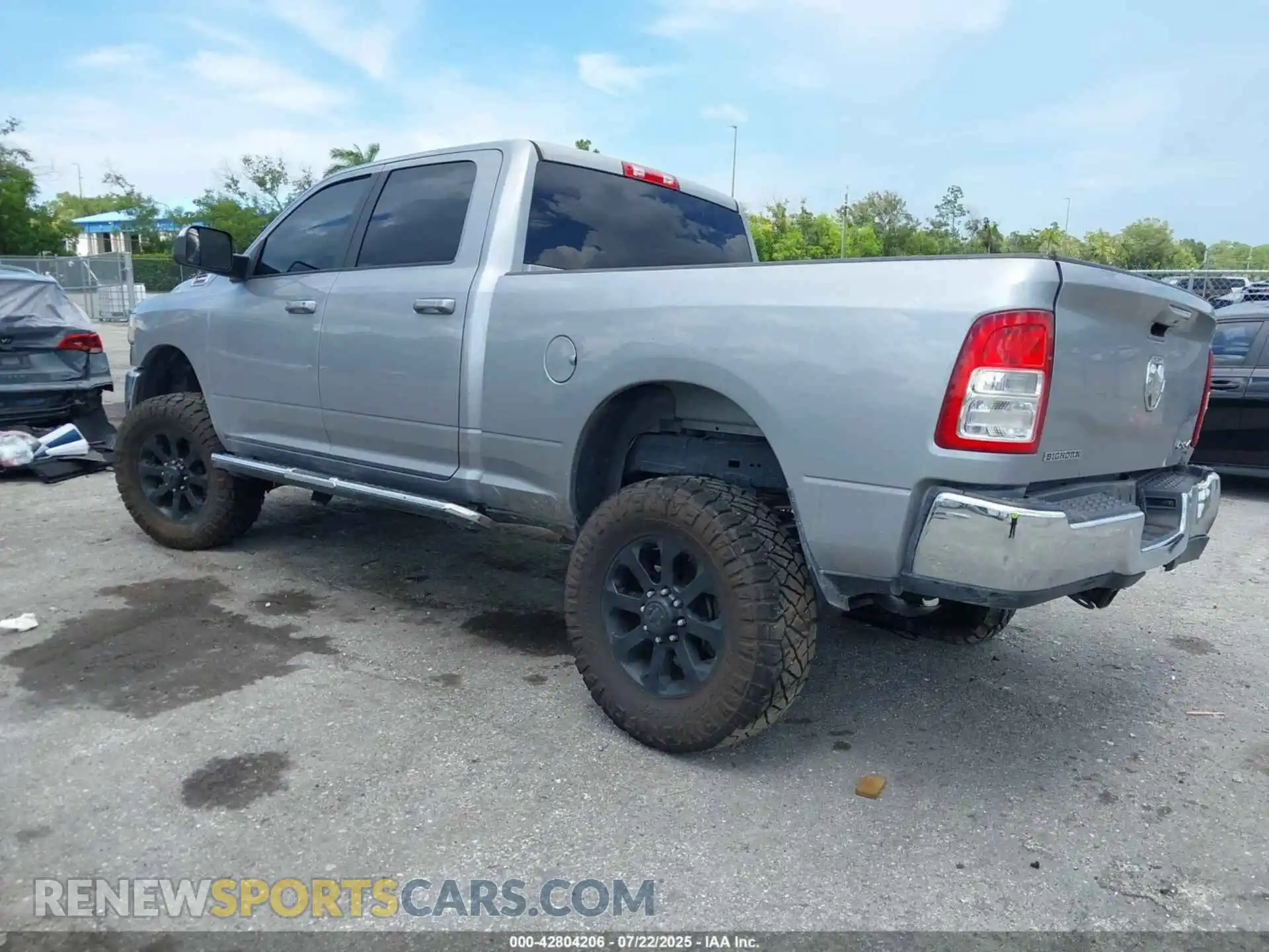 3 Photograph of a damaged car 3C6UR5DL8NG103847 RAM 2500 2022