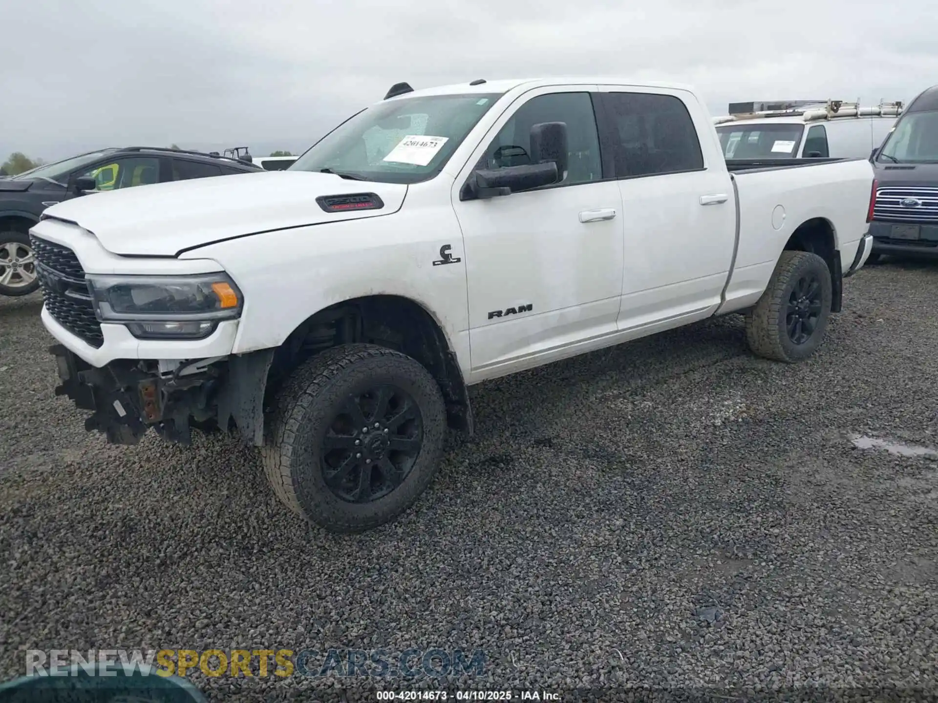 2 Photograph of a damaged car 3C6UR5DL8NG126870 RAM 2500 2022