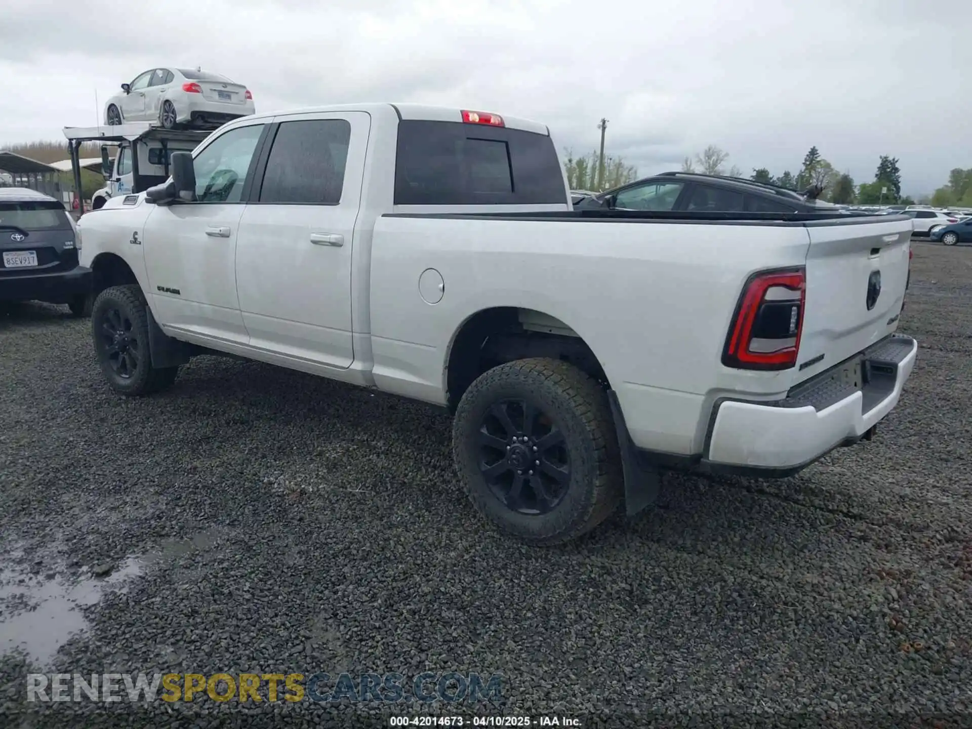 3 Photograph of a damaged car 3C6UR5DL8NG126870 RAM 2500 2022