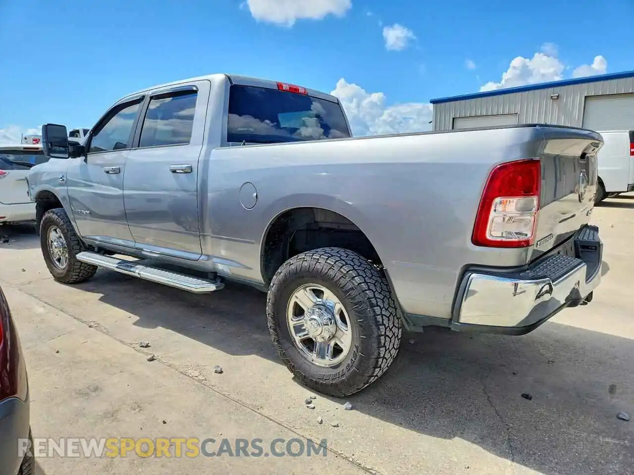 2 Photograph of a damaged car 3C6UR5DL8NG248466 RAM 2500 2022