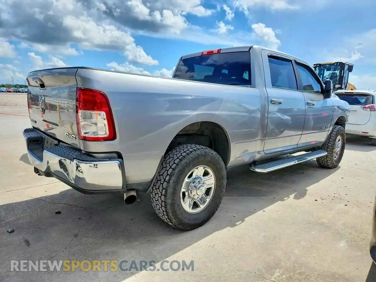 3 Photograph of a damaged car 3C6UR5DL8NG248466 RAM 2500 2022