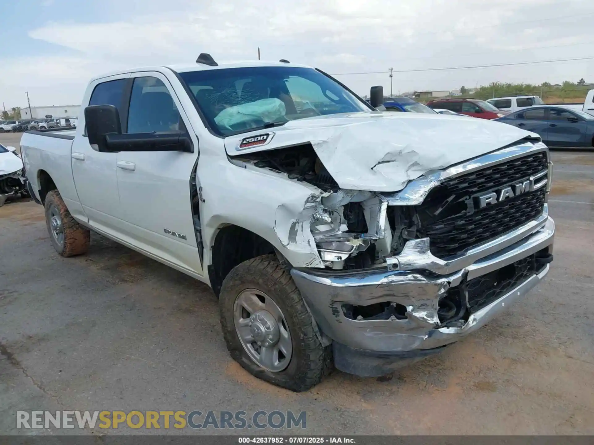 1 Photograph of a damaged car 3C6UR5DL8NG365559 RAM 2500 2022
